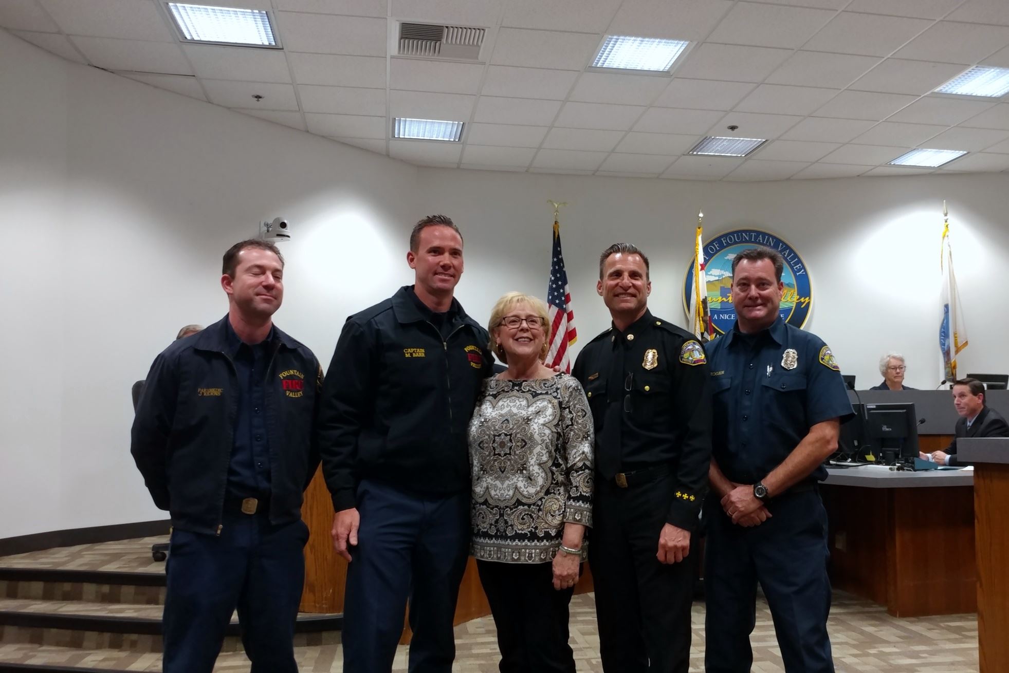 Chief Coppolino presented a Fountain Valley Fire Department Challenge Coin to Ms. Pena as a recognition of her profound humanitarian act towards another person.  